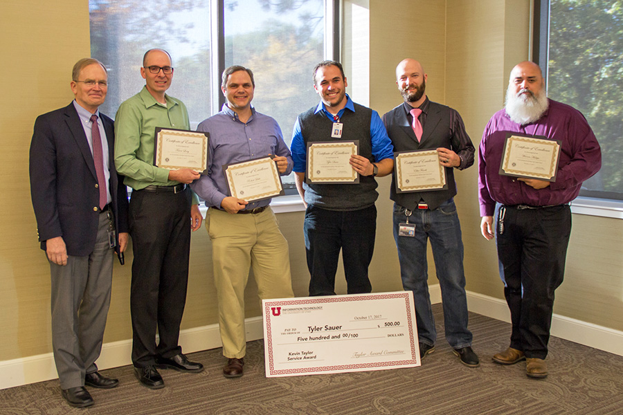 From left: CIO Steve Hess and 2017-18 Kevin Taylor Service Award nominees Trevor Long, Rob Lake, Tyler Sauer (this year's winner), Elliot Fenech, and Warren Malupo.