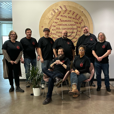 Back row, from left, CSBS Senior Associate Dean Rebecca Utz, Director for Computing Demian Hanks, Steven Jeffs, Josh Shupe, David Nelson, and Joseph Deviny. Front row, from left, Andrew Ballard and Nikole Widdison.