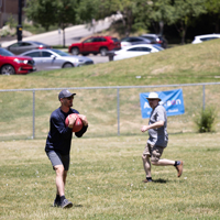 Patrick Tobin (SPS), foreground left, and Chris Moore (SPS) were positioned in the outfield. (Photo by Thanh Nguyen)