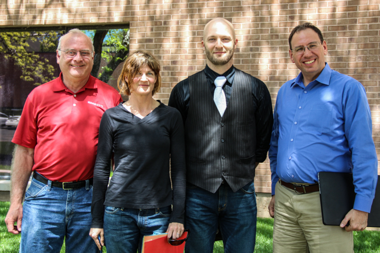 Three newest members of the IT Professionals Board of Directors — Mike Basinger, from left, Holly Christmas, and Elliot Fenech — with Board President Doug Ressler, right.